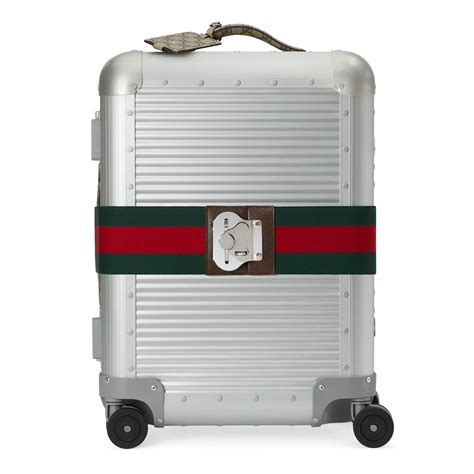 gucci luggage brand.